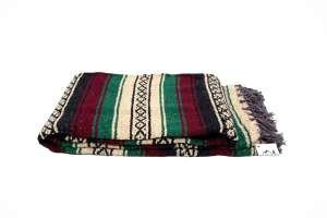 The Baja Leather Falsa Serape Blanket packs light for motorcycle campers.