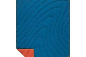 The Rumpl Deep Ember blanket packs small for motorcycle campers and is resistant to flame embers.