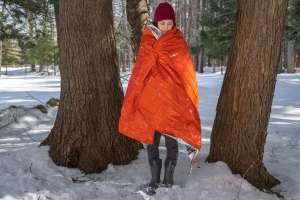 The SOL Emergency Blanket packs small for emergency camping situations.